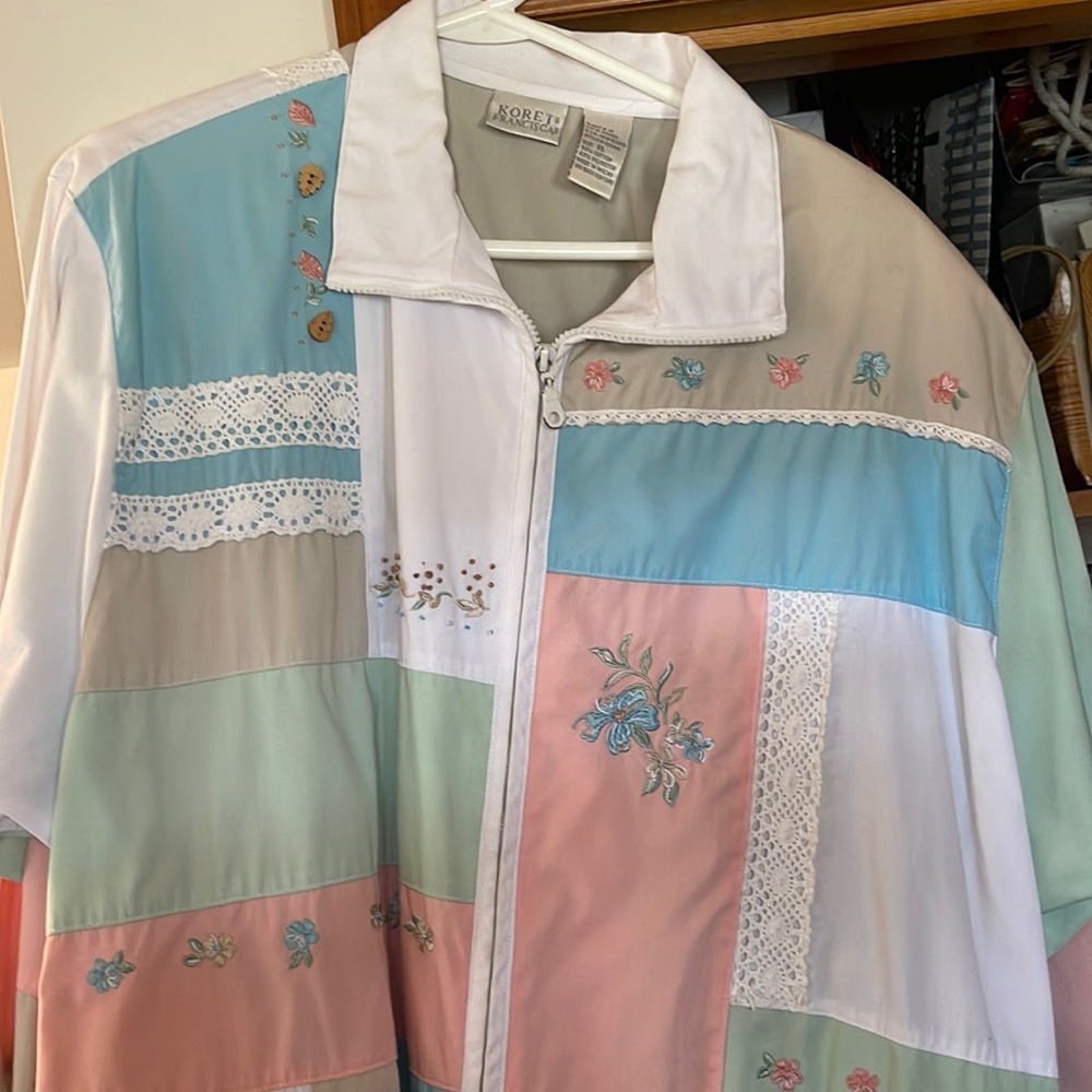 1990s style jacket was floral patterns and lace